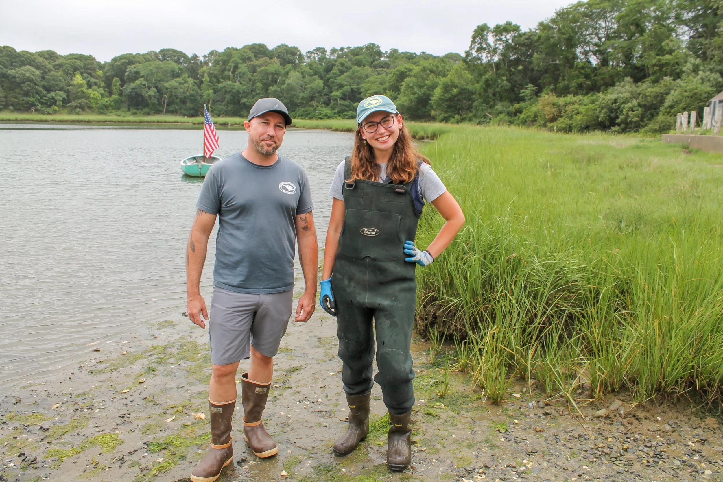 CCS Marine Fisheries Research Program Director Owen Nichols (left) and AmeriCorps Service Member Ella Wegfehrt (right) at Eastham Salt Pond