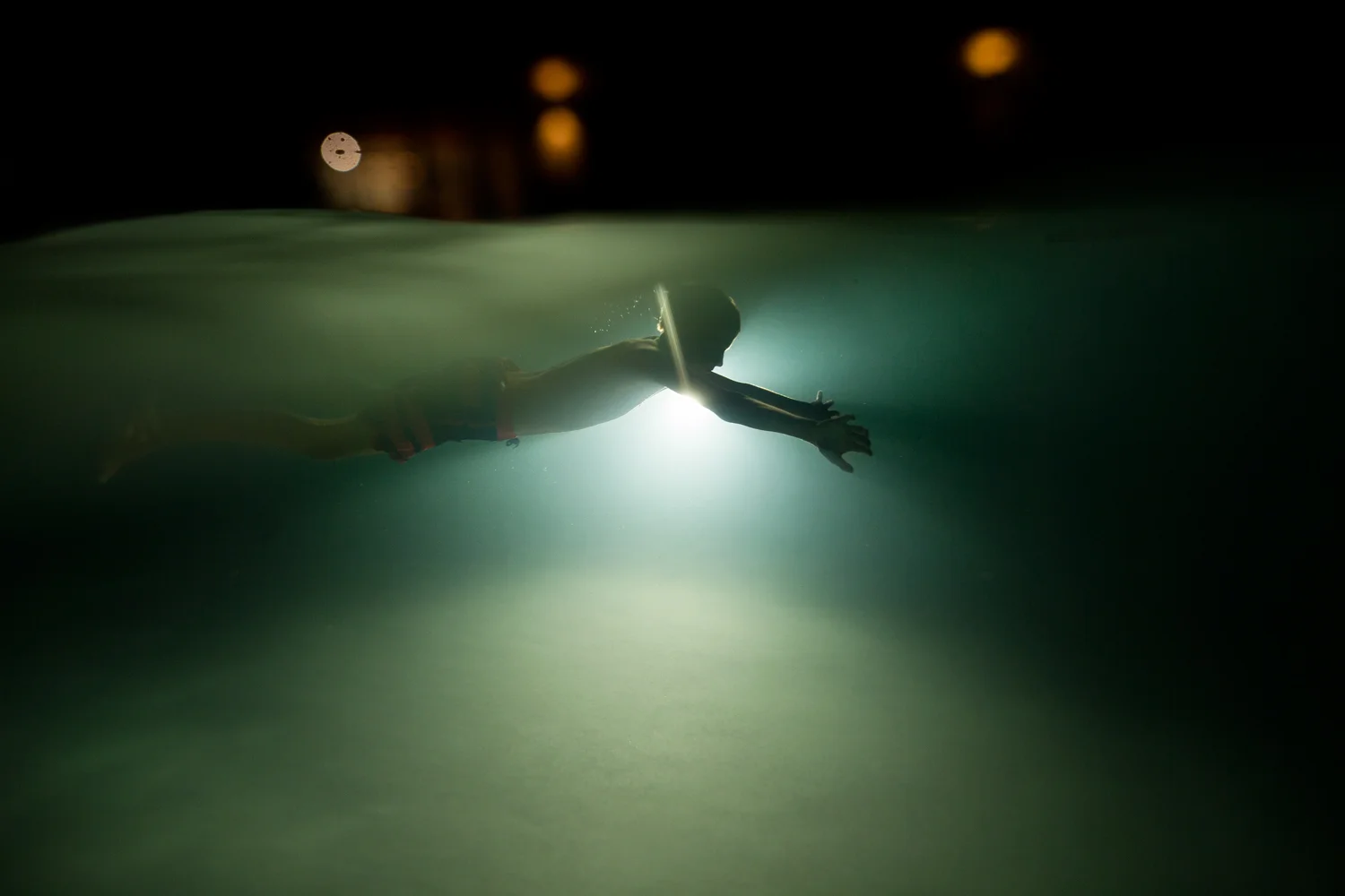 ArdelleNeubert_UnderwaterPhotography_Lights_Night_Pool.jpg