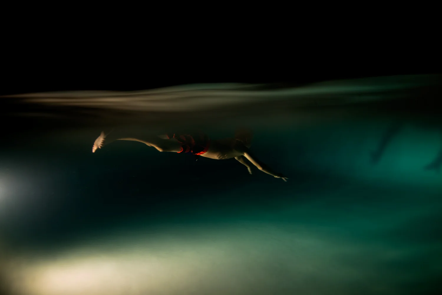 ArdelleNeubert_UnderwaterPhotography_Night_Lights_Swimming.jpg