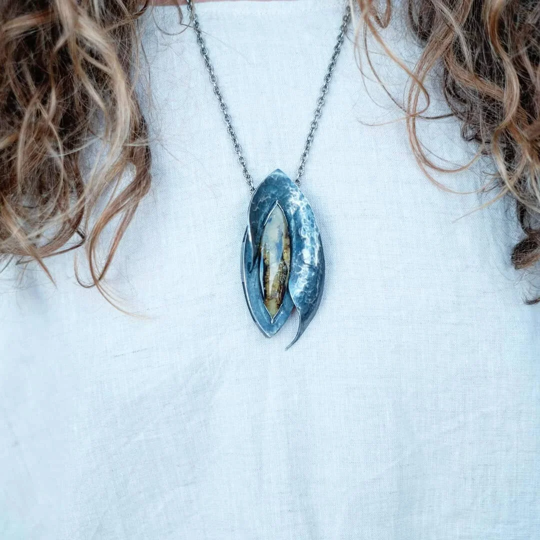 An oldie but a goodie. Forged sterling silver pendant with a big beautiful Baltic Amber at the center. Definitely a statement piece. 

Model: @daninellestyn
Photographer @essenceofbeing

#laineyraegoldsmith #jewellery #jewelry #jotd #jewelryoftheday 
