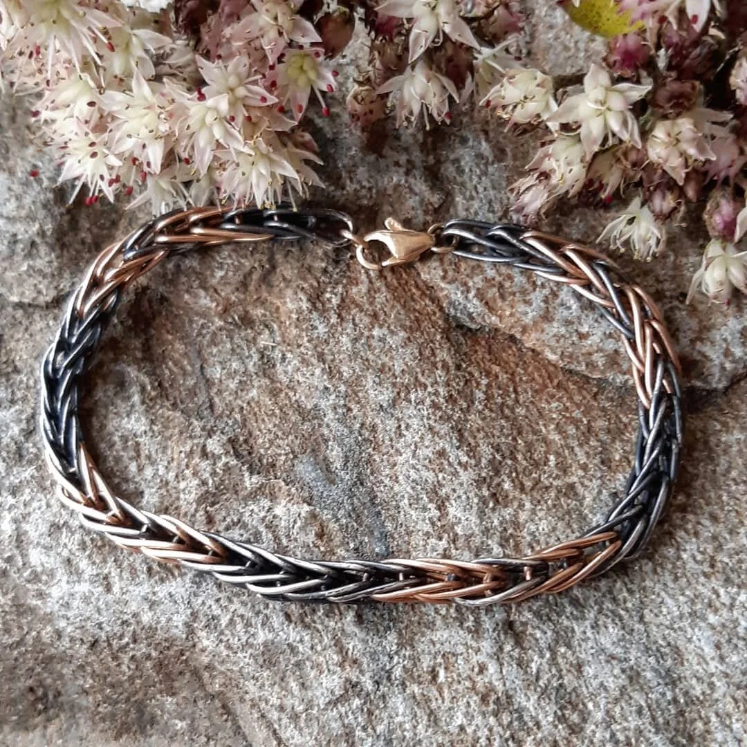&quot;Men have forgotten this truth,&quot; said the fox. &quot;But you must not forget it. You become responsible, forever, for what you have tamed.&quot; -Antoine de Saint-Exupery

Gold and oxidized silver links intertwine to create this classic fox