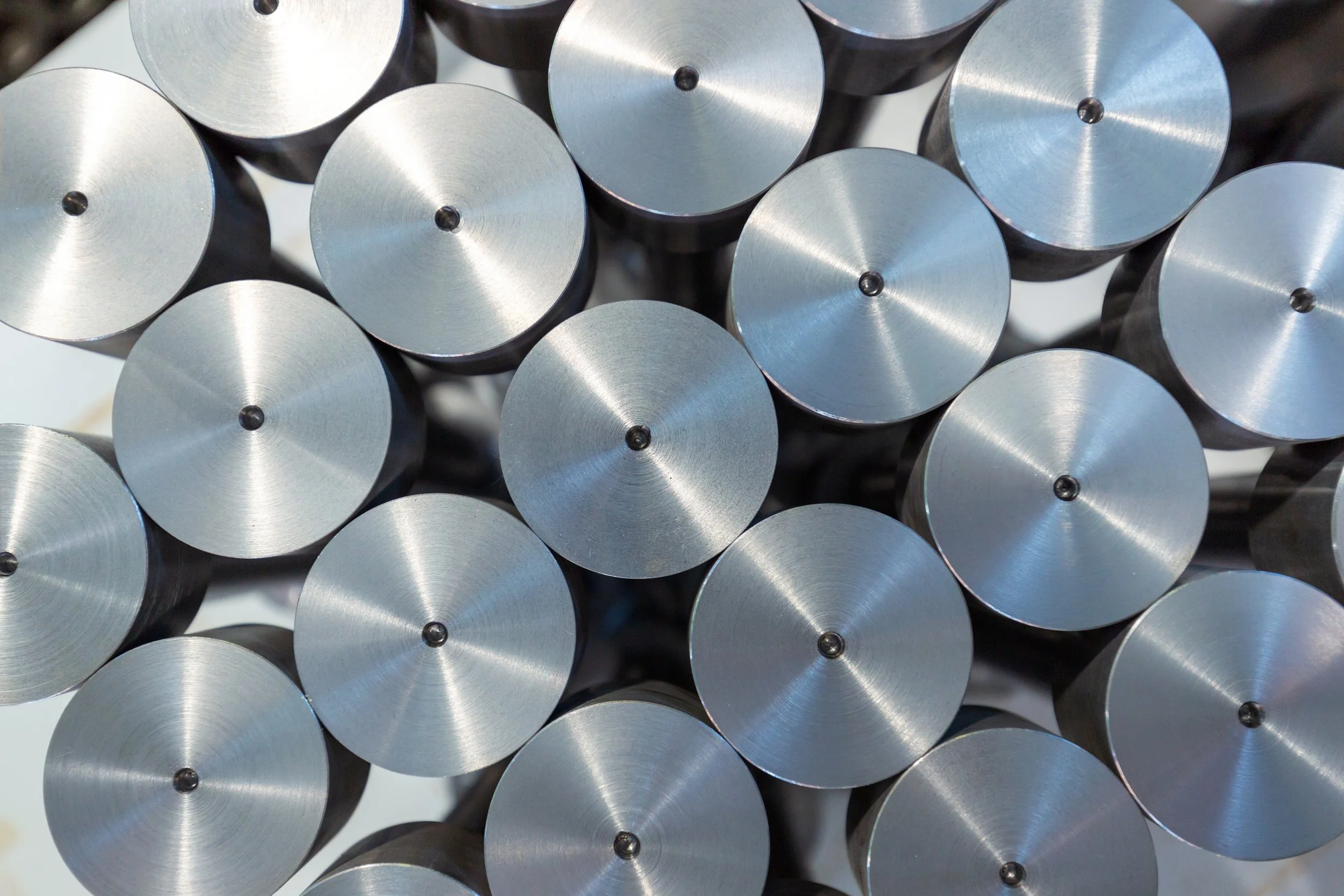 metal-cylinders-with-holes-in-industrial-arrangeme-2026-09-23-23-26-44-utc.jpg