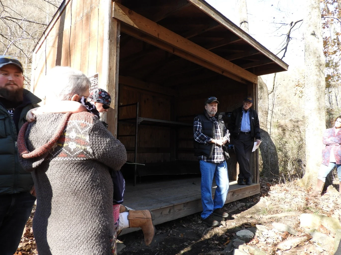 Mark Waddell “Doc Croc” remebers Lee while Phyllis and Giles listen.
