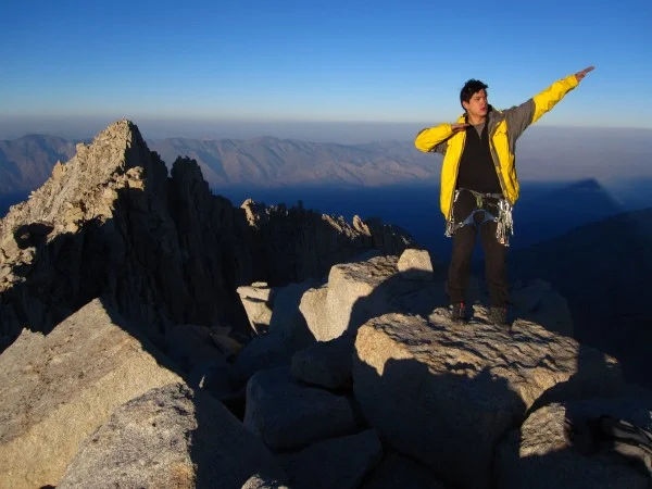 Scotty, always at home in his yellow jacket, with the Eastern Sierra behind