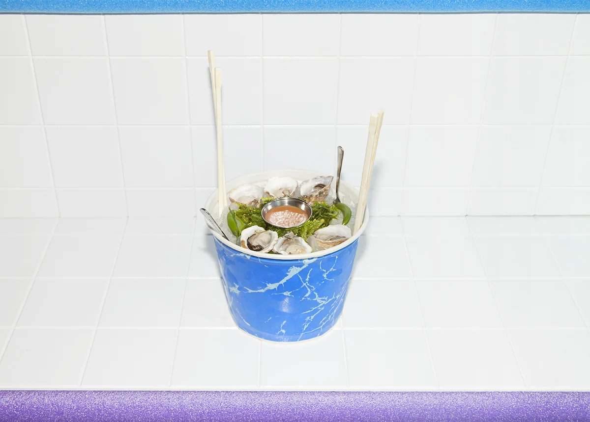 Half Dozen Fresh Oysters on the Half mezcal horseradish sauce, seaweed salad Photo by Josh Schaedel