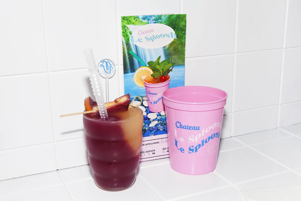 Vino Vortex (left) Burgundy, Torres 10, allspice, cinnamon, peach, pineapple layered with Velvet Chablis, ginger, anise, Bundaberg Ginger Beer, and Thai Basil Photo by Josh Schaedel