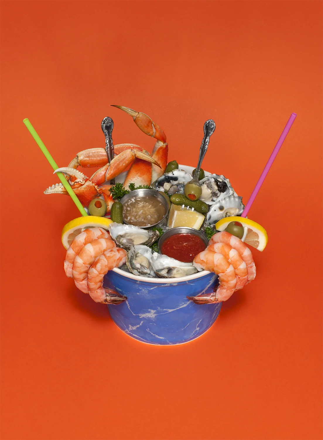 One of our greatest creations! The BIG MAMA from Lunar New Year at Chateau Le Sploosh Two martinis submerged in ice, half-dozen shrimp, half-dozen oysters, crab legs and claws, cocktail onions, pickles, olives, lemons, mignonette sauce, cocktail sauce, parsley Serves two. photo by Those People
