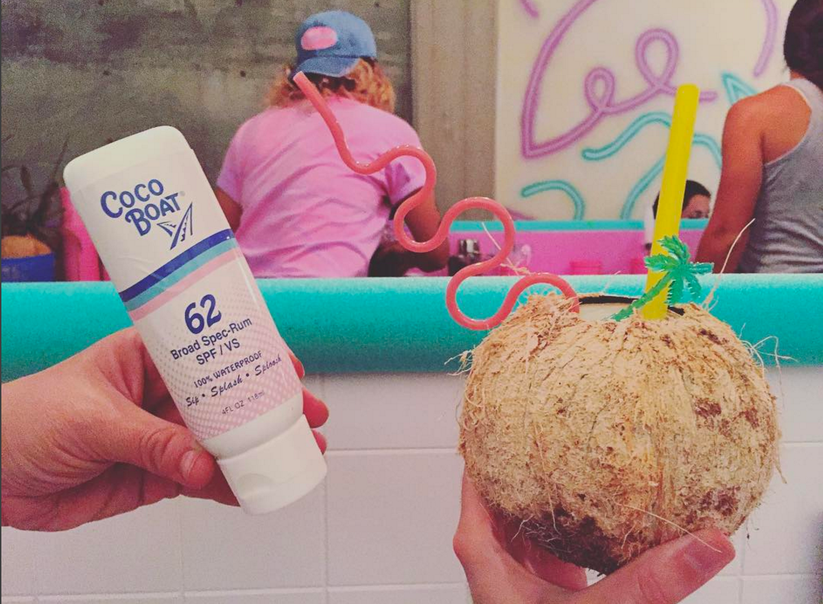 The Cocoboat 62; just squeeze the cocktail from the sunscreen tube into the coconut filled with crushed ice! Photo by Nathan Hazard