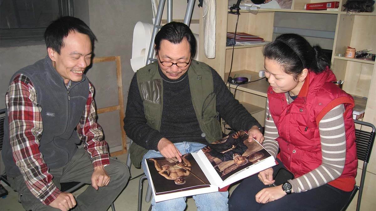 2009 ~ discussing painting techniques with classmates