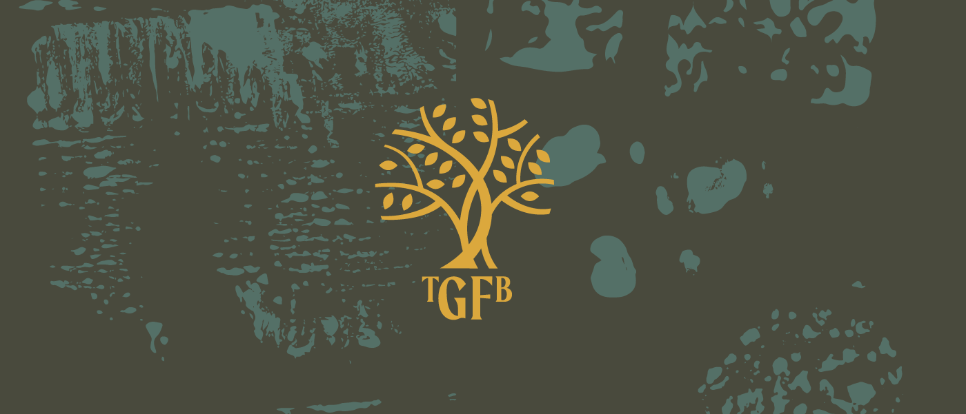An abstract graphic featuring a stylized tree with the letters "TGFB" beneath it, set on a textured dark background.
