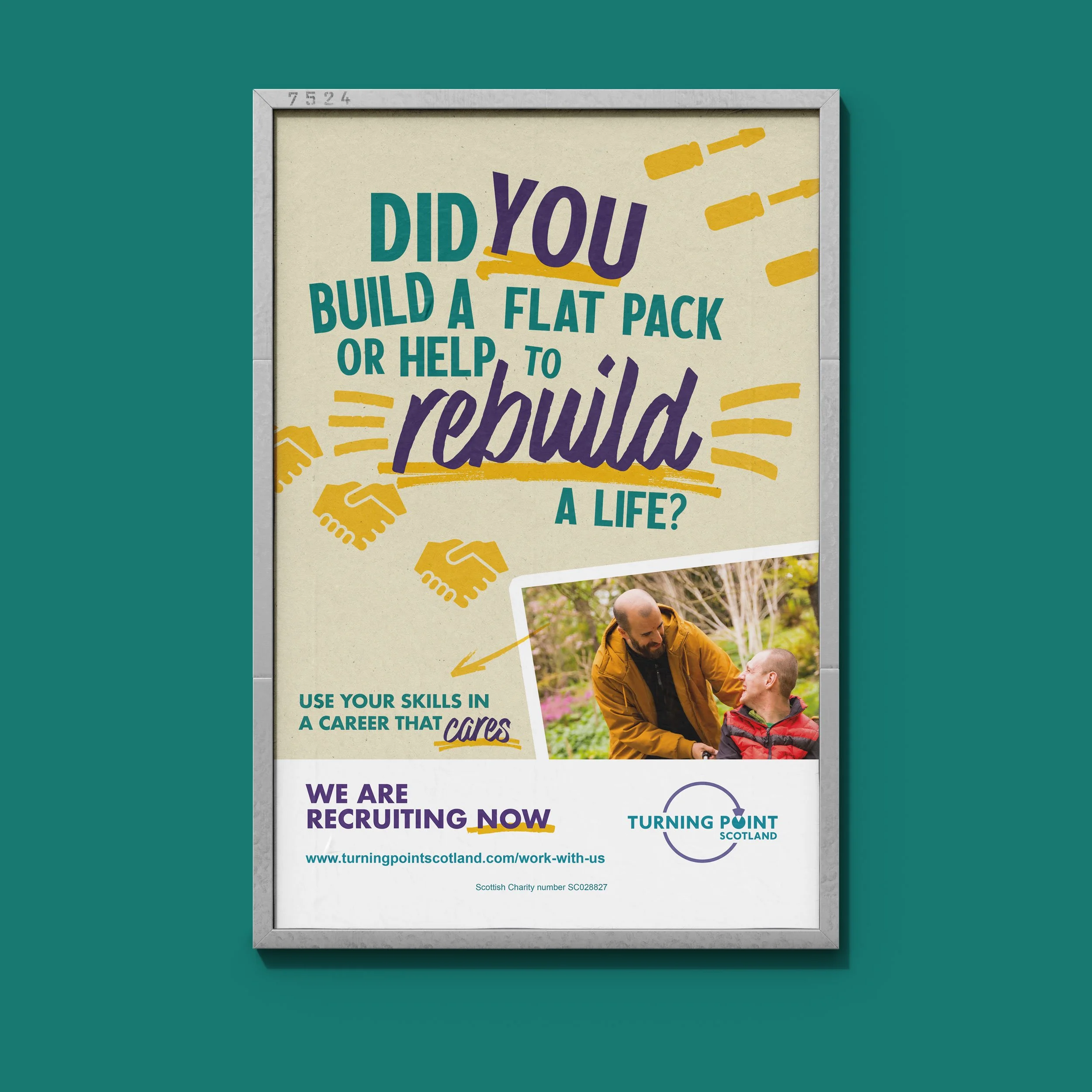 Framed poster promoting work with a charity, featuring text and images of a man and child outdoors, with additional text about rotating and a website link.