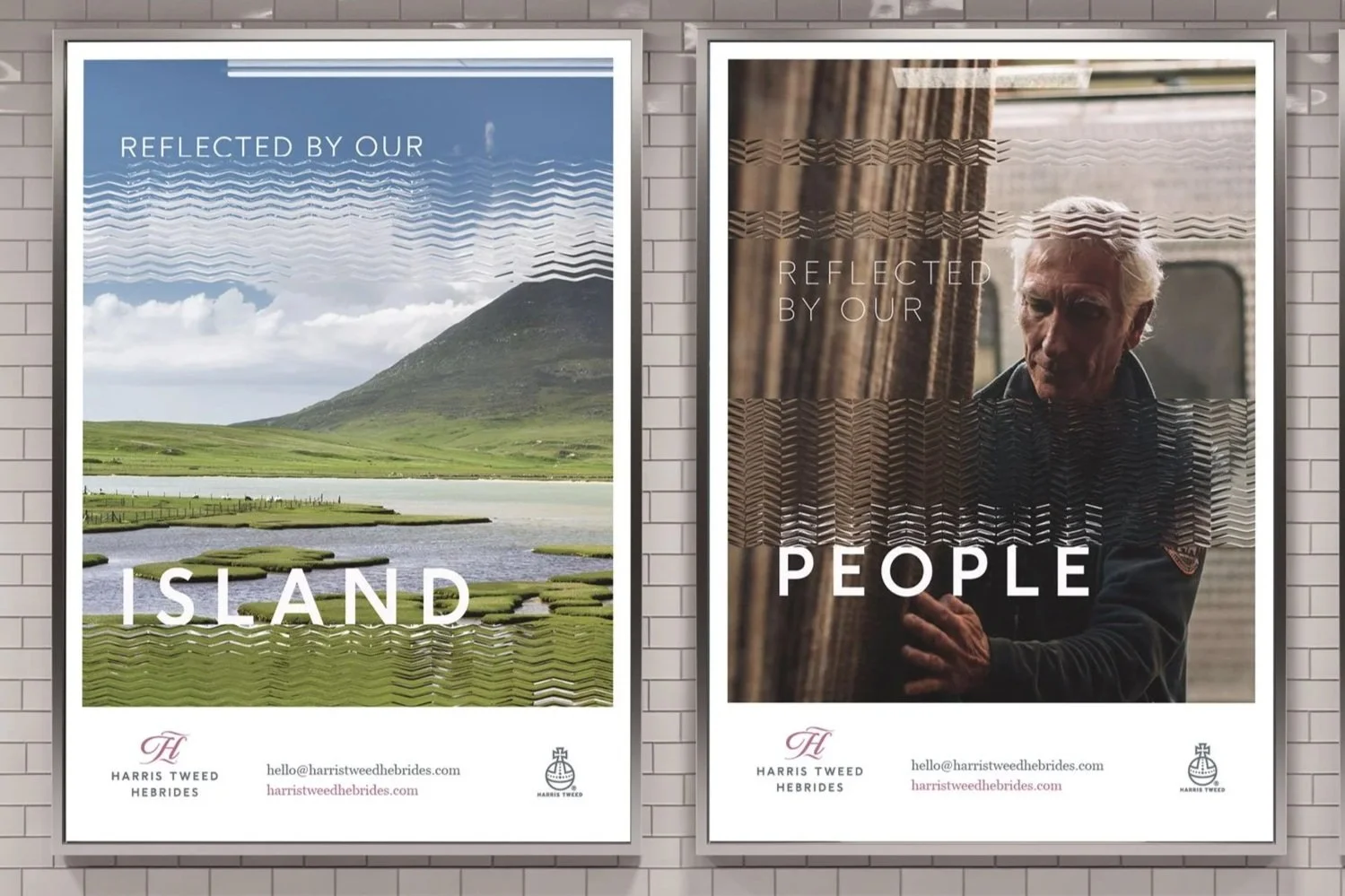 Two framed posters on a brick wall. The left poster shows a scenic landscape with a mountain, green fields, water, and a partly cloudy sky, with the text "Reflected by our Island." The right poster features an elderly man with white hair and a serious expression, with the text "Reflected by our People." Both posters include the logo and contact information for Harris Tweed Hebrides.
