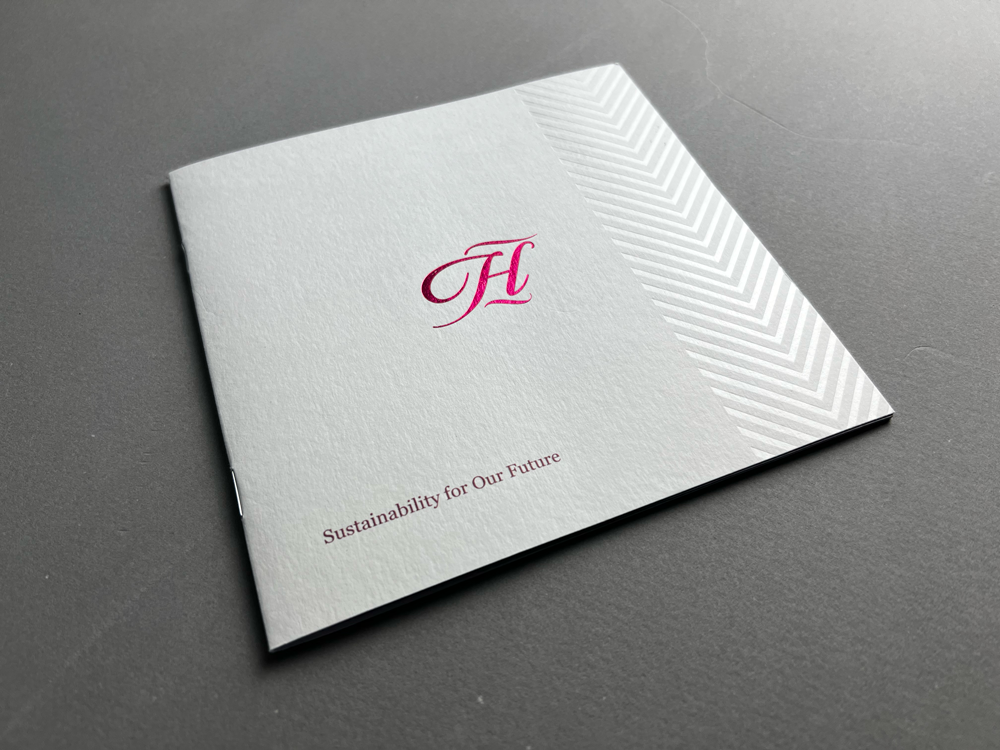 A printed embossed foiled booklet cover for Harris Tweed Hebrides' sustainability.