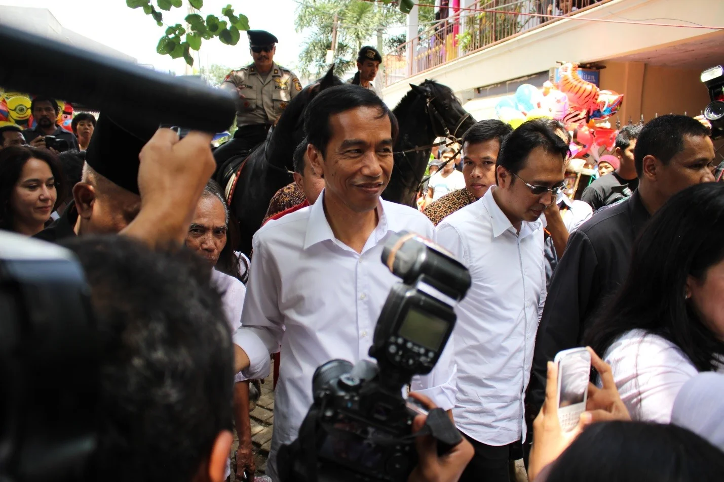 © Photo of (then not-yet President ) Joko Widodo during balloting for Legislative Elections, taken by M.P.Stadler, 9 April 2014