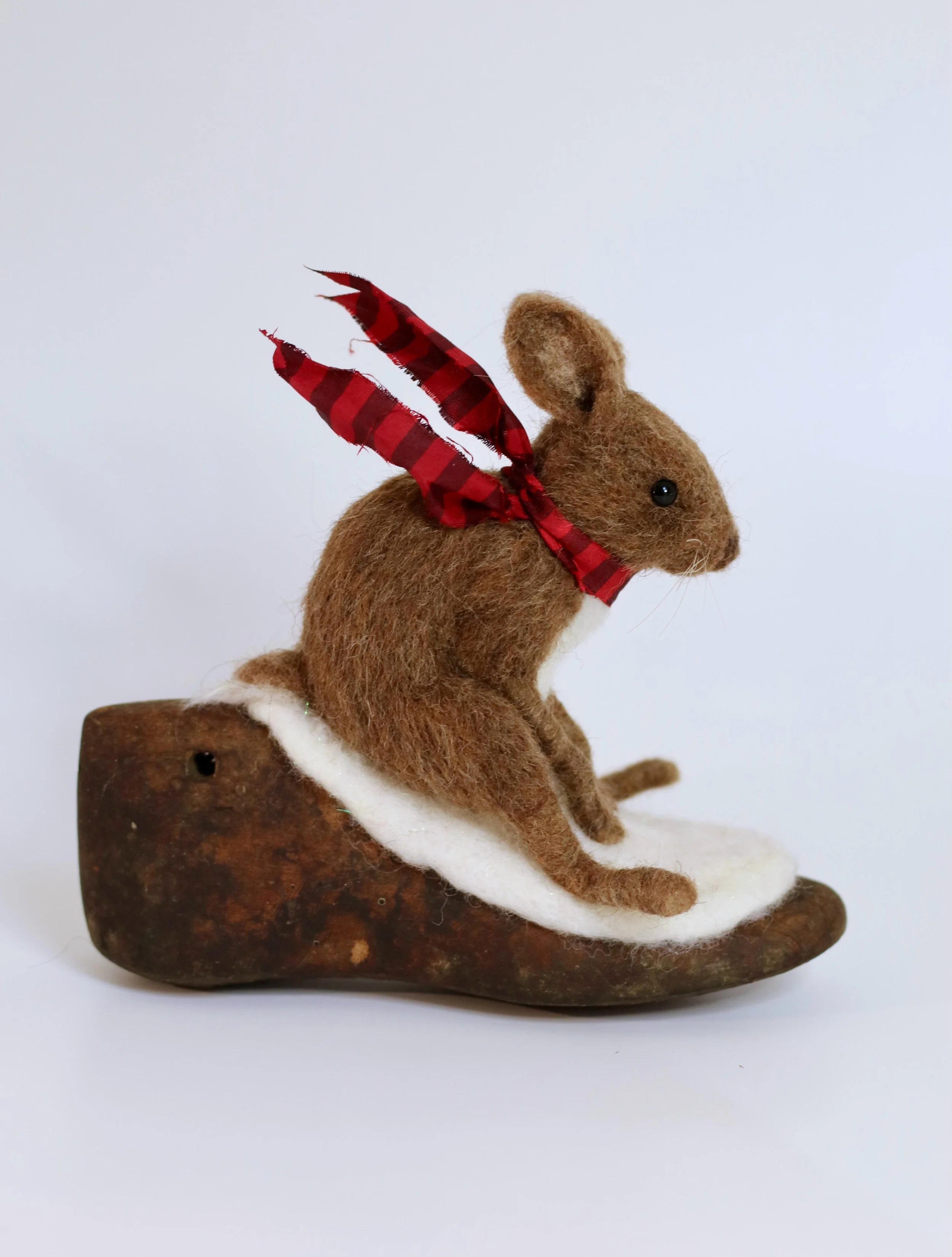 Bunny Slope
6x6 inches
Needle-felted wool rabbit mounted to an antique wooden shoe stay.
Available now at www.pipingploverlove.com