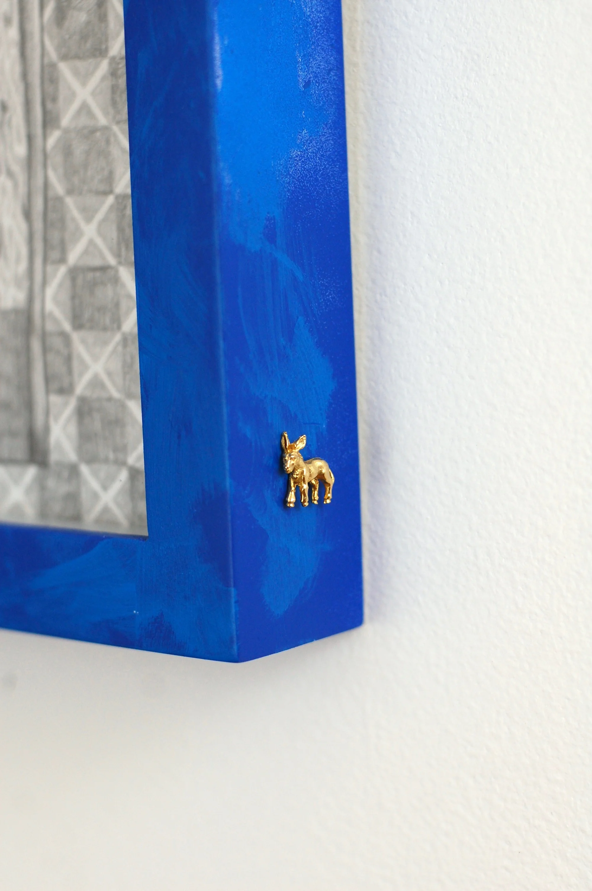 No title. 2018. Graphite on paper. Spray and acrylic paint, and enamel pin on wooden frame. 9x12in.