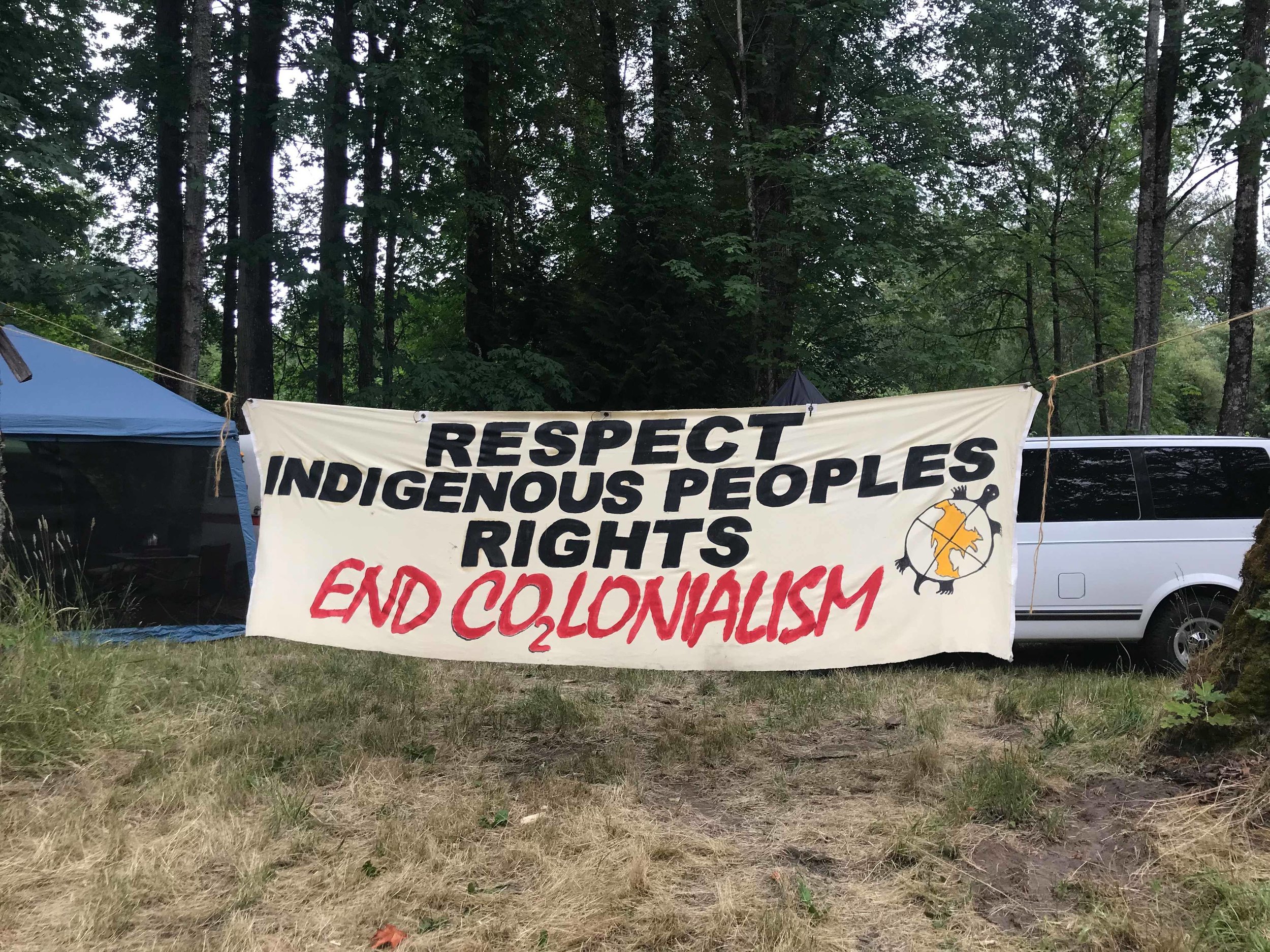 Banner hung near campsites.
