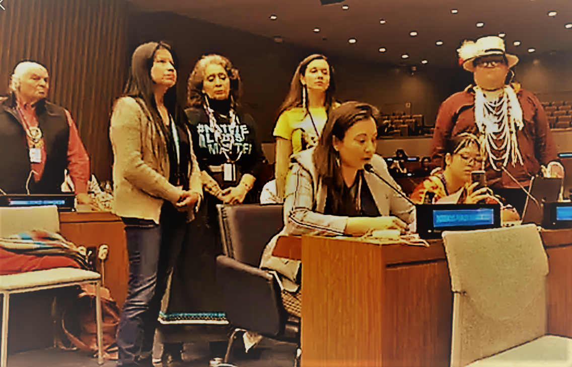 North American Indigenous Peoples standing in solidarity with Melina and Christine’s intervention, including Claudia Velandia-Onofre and LaDonna Tamakawastewin Allard.