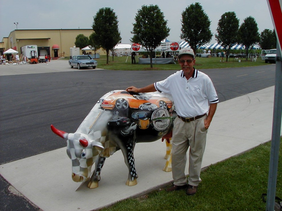 John and Porsche cow.jpg