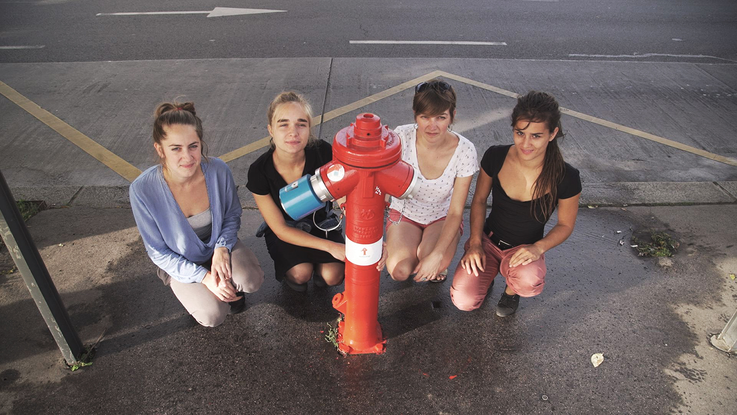 ReHydrant project team with their first installed invention. They converts hundreds of fire hydrants into drinking fountains across the country.