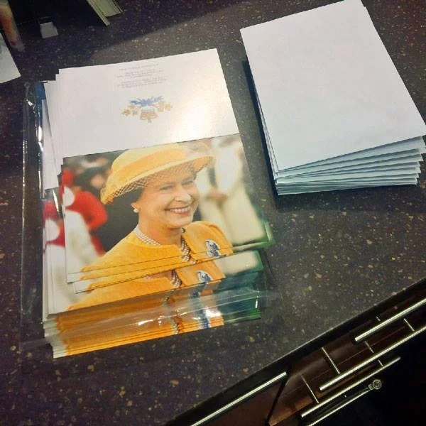 Packaging cards to celebrate The Queen's 90th Birthday, and the 125th Anniversary of the forming of The 48th Highlanders of Canada. Good thing I didn't have to sign them all!