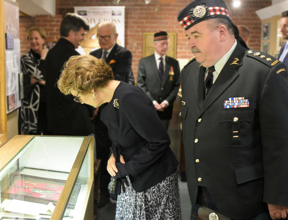 Princess Margriet of the Netherlands examines the medals and mementoes of Col. Marshall commander of the 48th Highlanders who was killed in Holland. A hero to the 48th to this day. HRH saw these on her way into the 48th Museum and stopped to look at them in closer detail as she was leaving. For information on the museum click here: http://www.48highlanders.com/04_03.html
