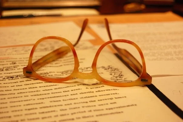 Robert Kennedy's reading glasses on his desk.