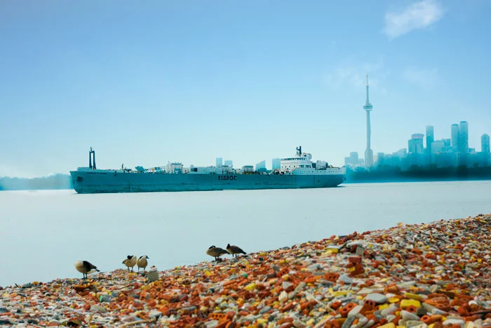  A ship full of cement mix heads out on the Great Lakes. 