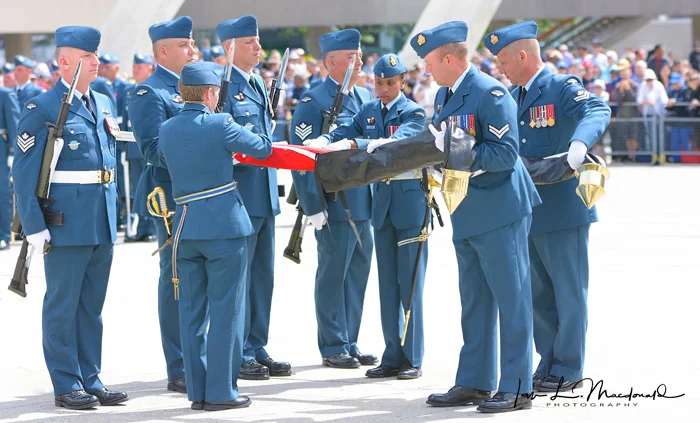 Her Majesty The Queen's Colours are uncased alongside the new RCAF Colours for the first time