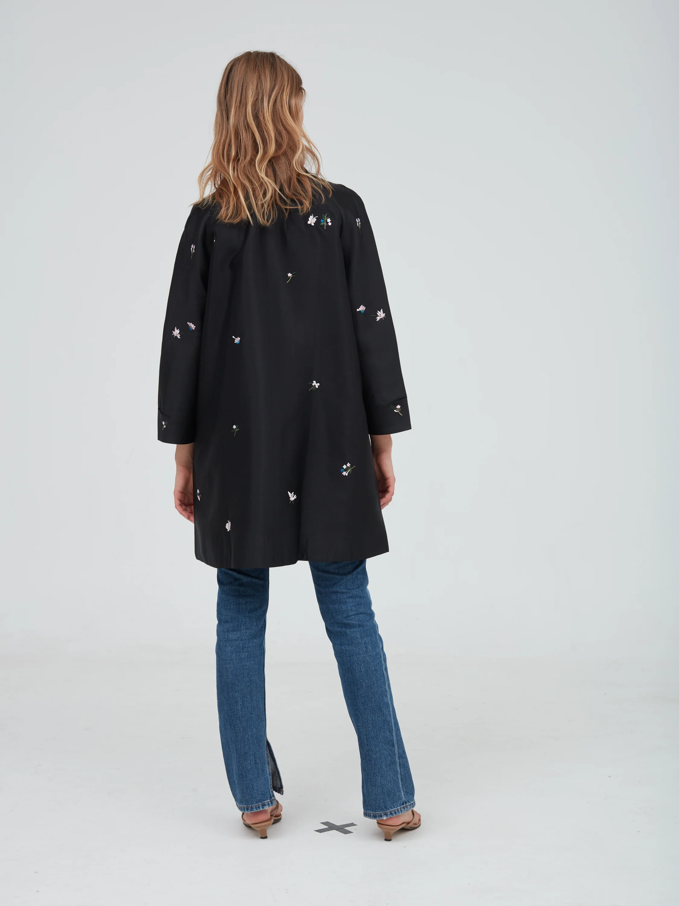 BeigeJacketBlackBack.jpg