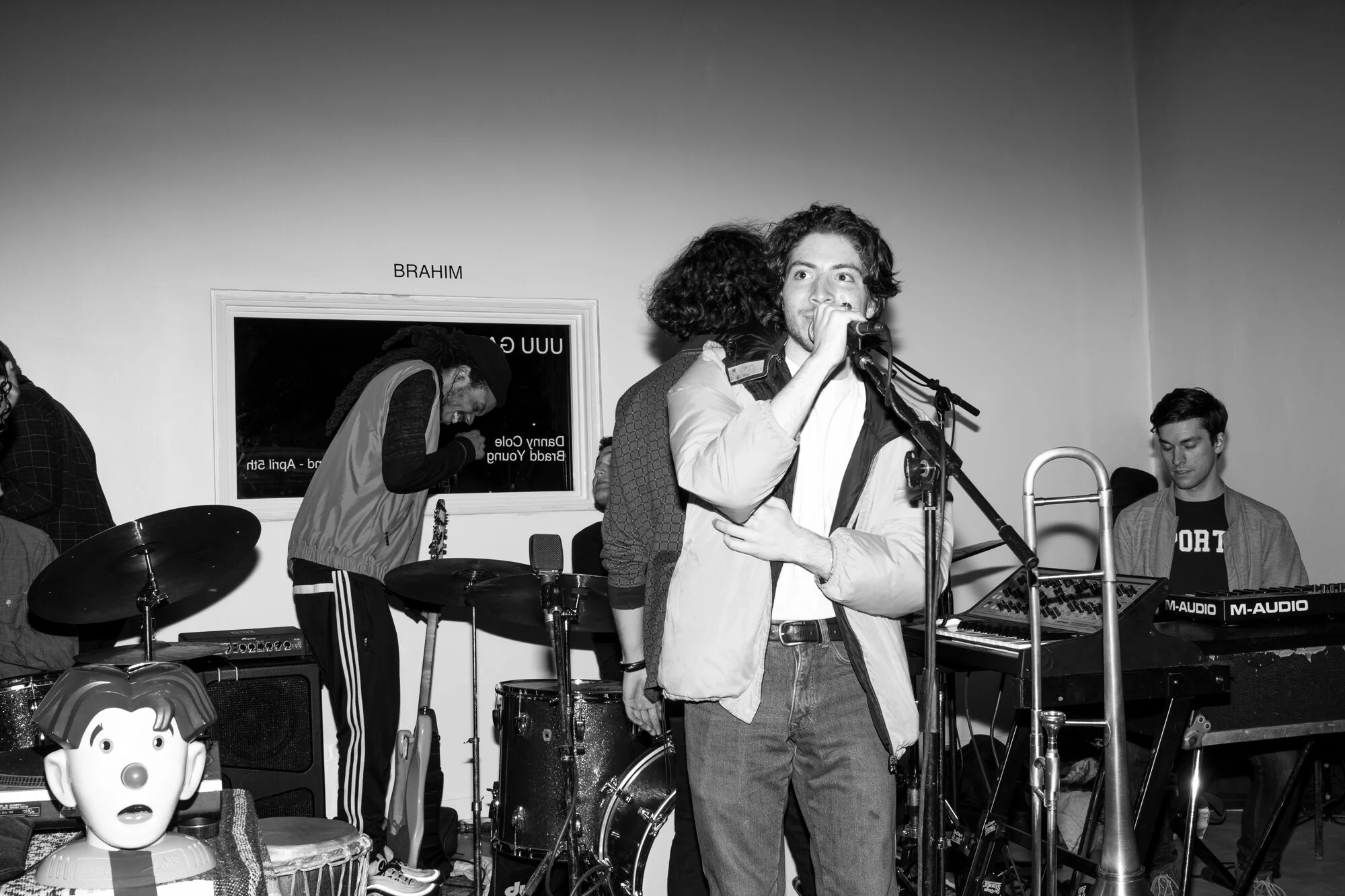 Cole speaking at his art opening at UUU GALLERY in March, 2019
