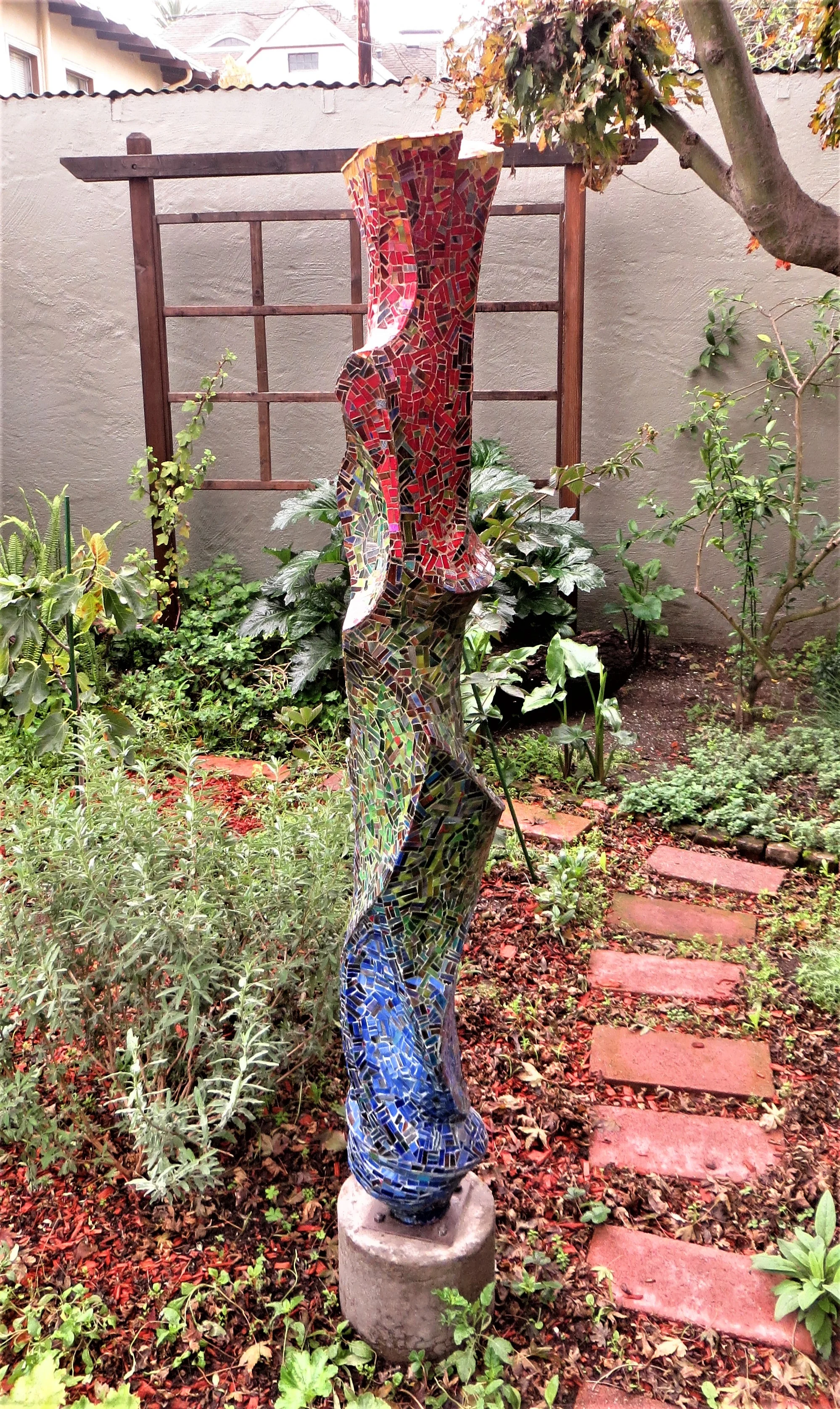 The Seasons, 2014. Cast concrete, encased in glass mosaic. 67"H x 12"W x 12"D