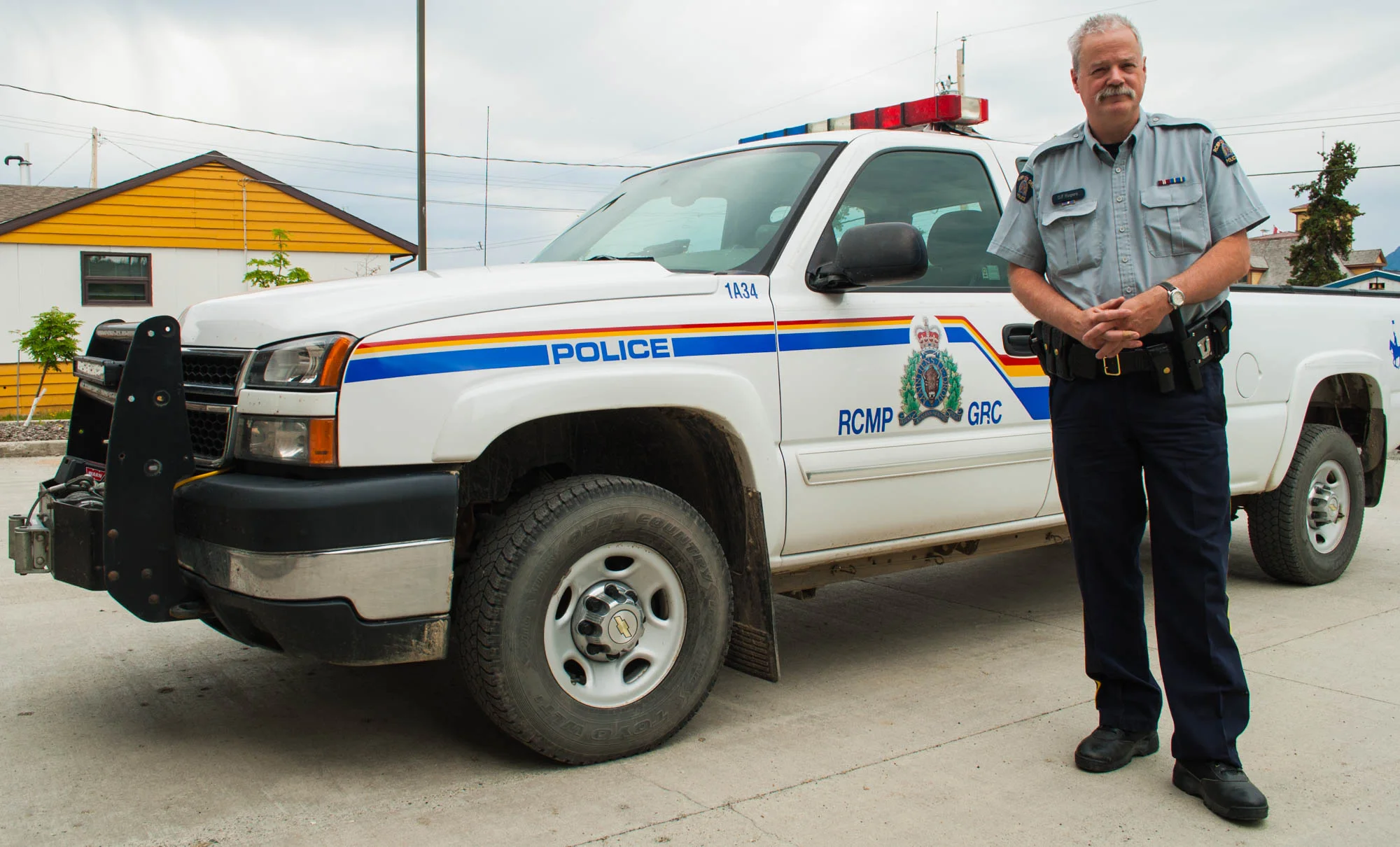 Don Rodgers, a retired police officer from Whitehorse, puts the badge back on another time for the Atlin Arts and Music Festival.