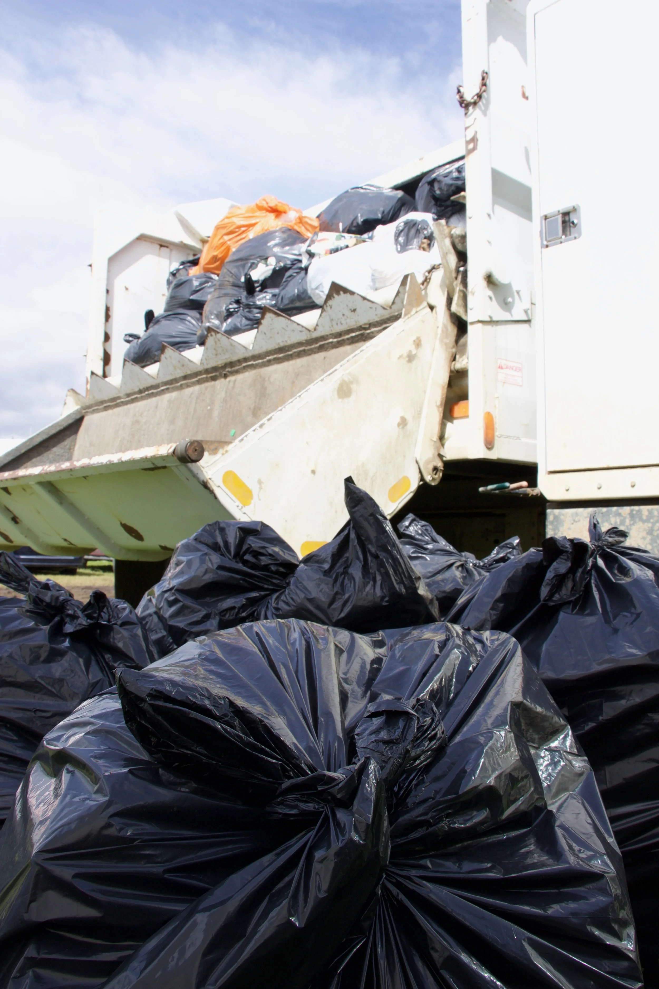 The Atlin dump truck, the base for the green team at the Atlin Arts and Music Festival, takes the garbage to the local landfill.