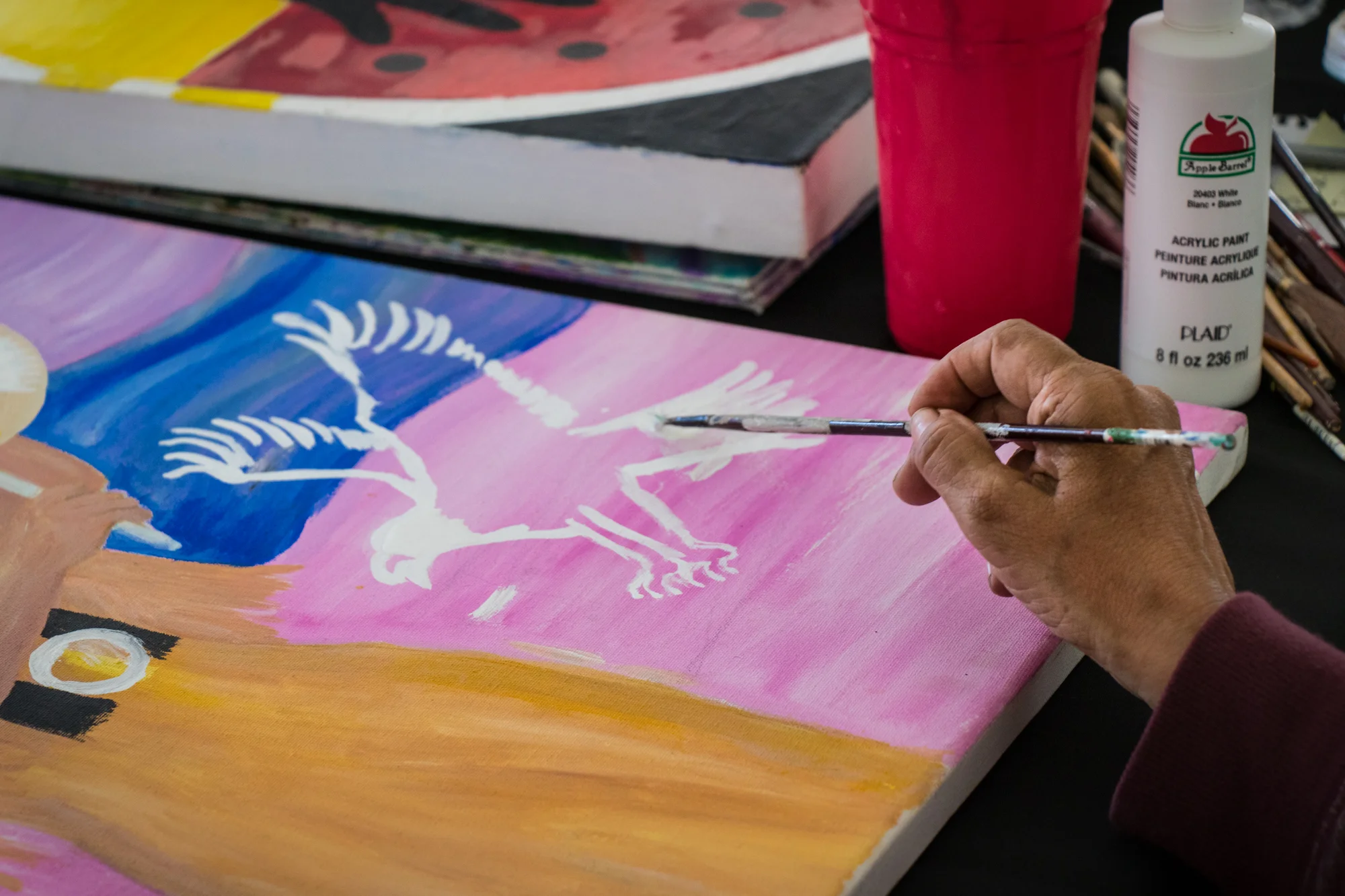 She recalls one professor constantly pushing her artistically. Each week when the class displayed their work, he would tell her that her art was lacking emotions.