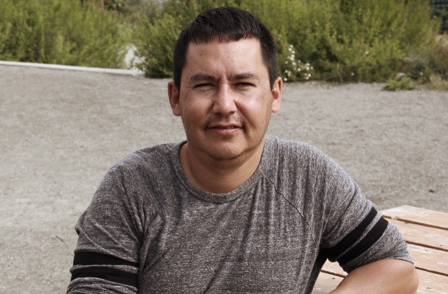 Councillor Sean Smith, councillor of education for the KDFN, poses outside the Kwanlin Dun Cultural Centre in Whitehorse. Photo by Amy Burlock.