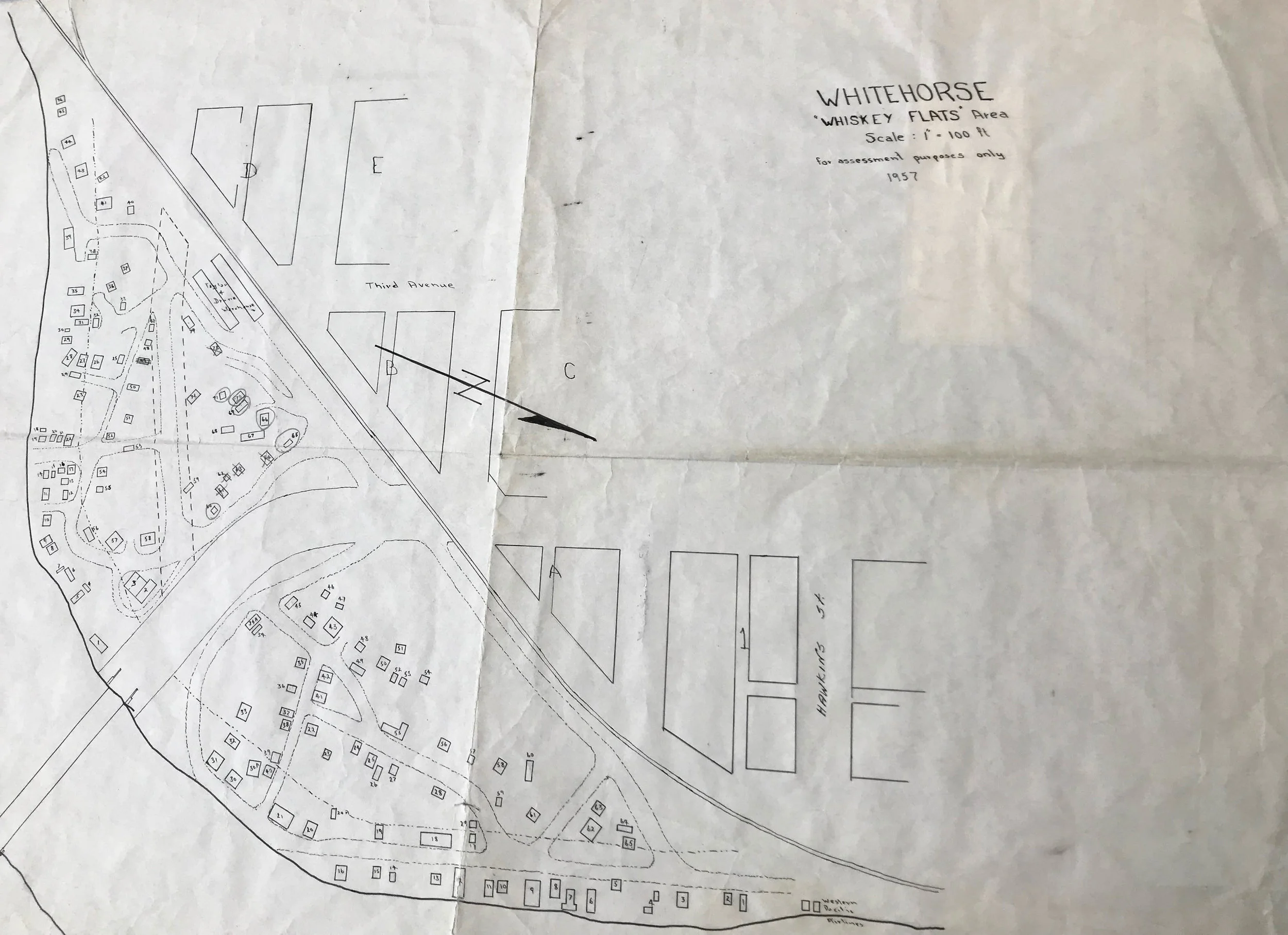 Assessment map of Whiskey Flats Whitehorse, YT, in 1957. Accessed through Yukon Archives.