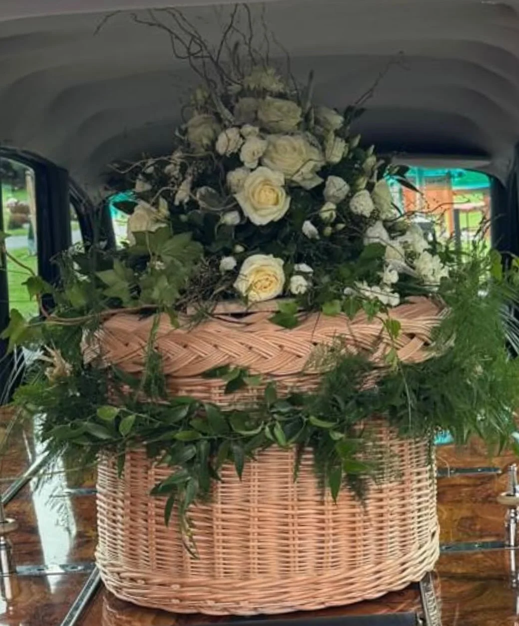 A beautifully hand crafted willow coffin in weatherbeaten gold from @somersetwillowcoffins dressed with stunning floral design from @fleurette_frinton for my mums final journey. #basketmaking #craftsmanship  #beautifulflowers #floraltribute