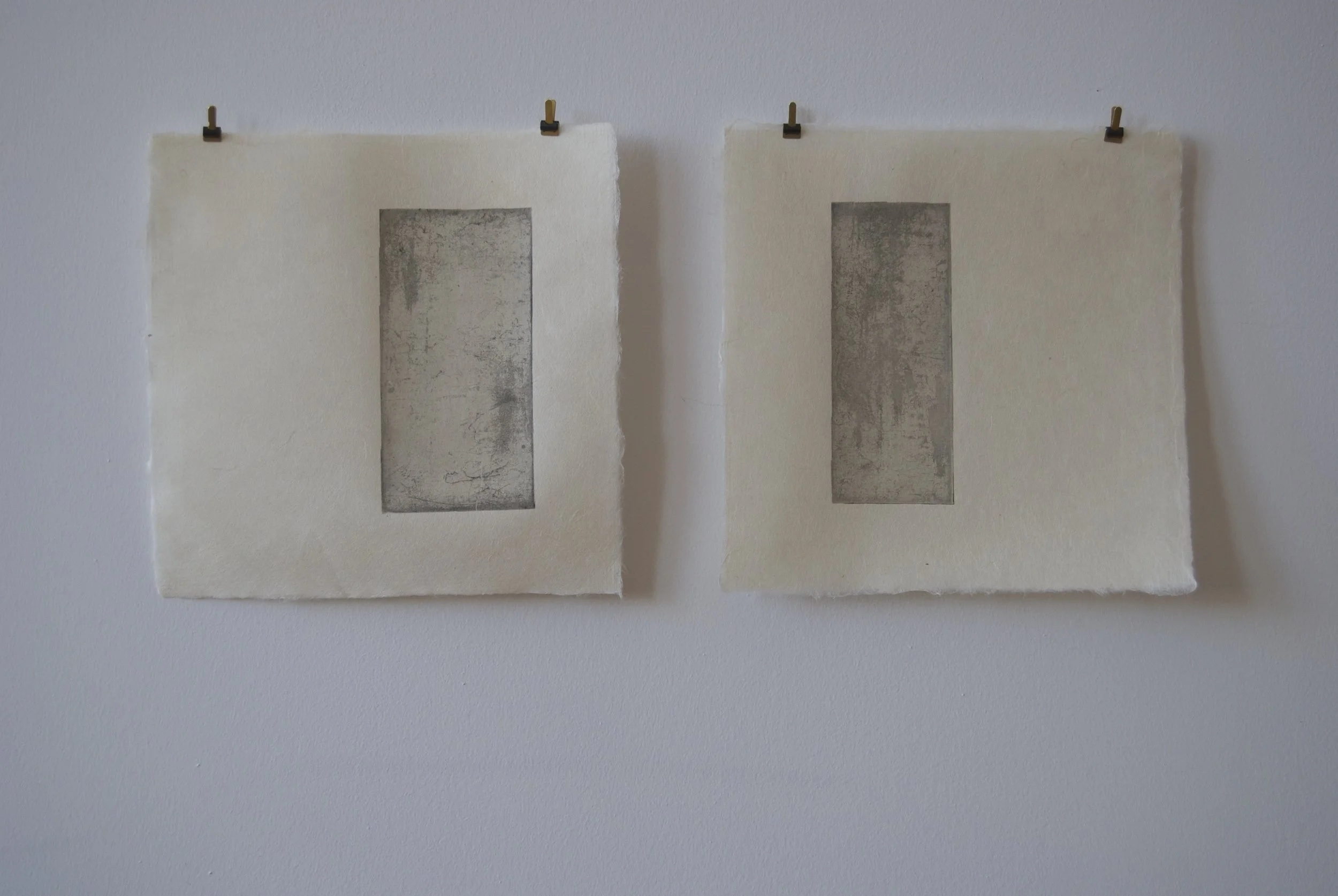 “alternatively, " (march 2016) intaglio prints, folded chine colle. varied edition (1/5) using two plates that once formed a square, coated, and carried for approximately ten months while walking. etched with aquatint. diptych, 7.5” x 7.5”