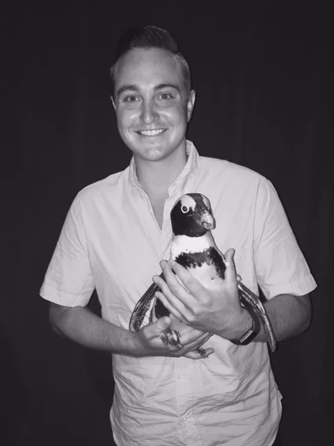 Holding Aurora the 3 1/2 year old African Penguin. 