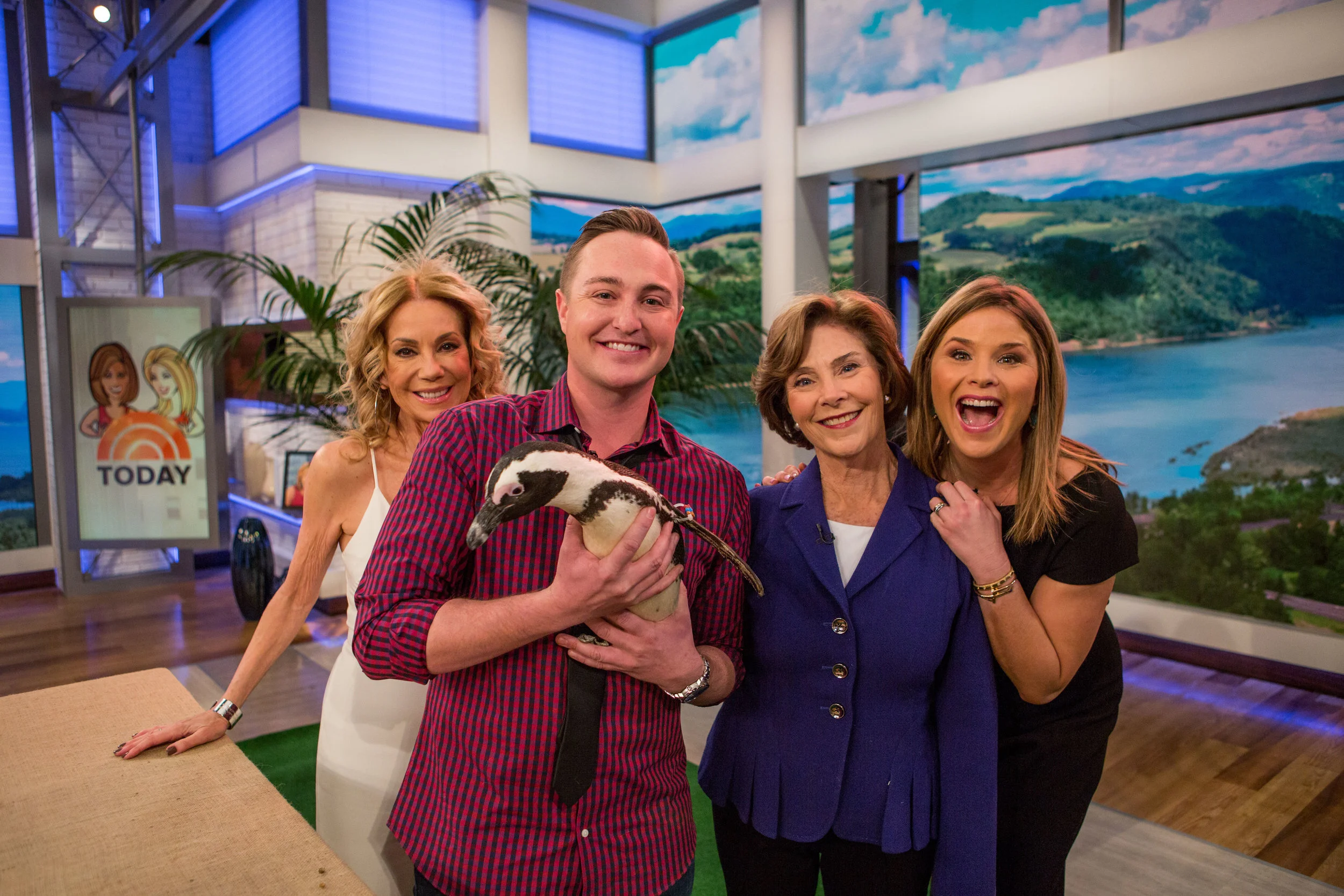  On the set of "The Today Show" with Kathie Lee Gifford, Laura Bush, Jenna Bush Hager, and Aurora the African Penguin. 