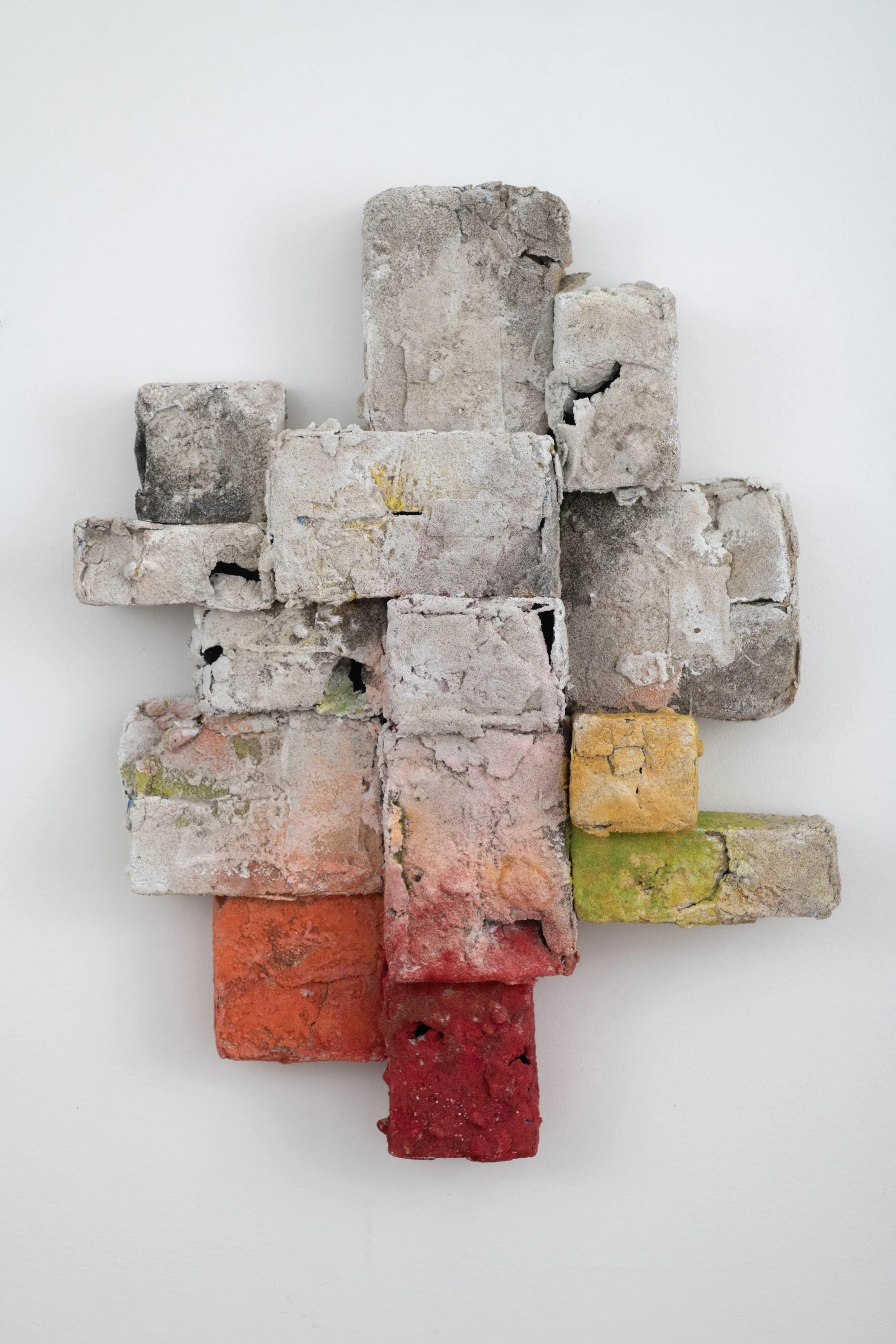 Mark Van Wagner_In the Rose Garden_2025_ natural and pigmented sand, foam,debris on cardboard boxes_35x27x8 inchesII.jpg