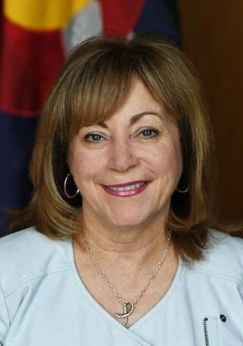 Dianne Primavera is a leading patient advocate who has spent three decades fighting for every Coloradan’s access to quality, affordable health care. As a young mom in 1988, Dianne was diagnosed with breast cancer. Her doctor told her that she had, at most, five years to live. Since her first diagnosis, Dianne has fought cancer four times and survived. Her personal battle with cancer inspired her to make it her life’s work to ensure every Coloradan has access to the health care they need when they need it. In 1990, Dianne joined the Rocky Mountain Regional Brain Injury Center, where her work focused on helping individuals dealing with serious injuries recover and resume dignified, fulfilling lives. Since then, she’s held many prominent positions throughout the public and non-profit sectors devoted to furthering life-saving medical research and connecting Coloradans who experience illness with the treatment they need to recover. In 2006, Dianne was elected to the first of four terms in the State Legislature, representing Broomfield, Superior, and parts of Erie. Throughout her service, Dianne was highly regarded for her success working across the aisle to promote Colorado small businesses, lower prescription drug costs, and expand access to affordable health care. Some of her major successes included: - Expanding Medicaid and private-insurance coverage for cancer screenings and women’s preventative health care - Securing insurance coverage for autism services for children in Colorado - Enhancing privacy protections for Coloradans’ personal medical information - Creating a program to distribute unused cancer drugs to patients who could not afford them - Creating a Business Personal Property Tax Credit to reduce costs for small businesses Most recently, Dianne served as the CEO of Susan G. Komen Colorado, one of the largest organizations in the country dedicated to breast cancer prevention, treatment, research, and education. Dianne is a lifelong Coloradan and a Broomfield resident. She has two adult daughters and a one-year-old granddaughter, Kailani. Dianne is also an avid country dancer — taking after her dad, who was a dedicated ballroom dancer throughout his life, even on his 95th birthday.