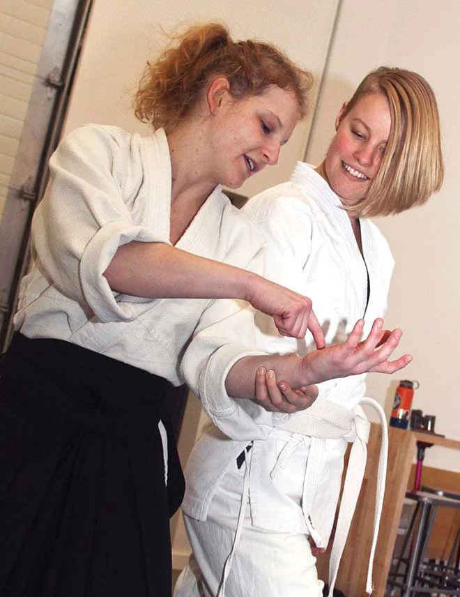 SomethingNew_Aikido_Megan-learns-grip_1752_JB.jpg