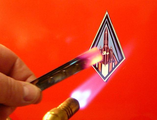 This photo shows me holding in my bare hand a small shard of Titanium from the SR-71, glowing RED HOT! Try that with a piece of aluminum or stainless steel.