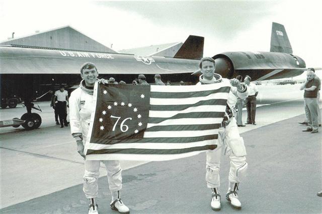 Col Morgan and Maj Gen Joersz holding this Bicentennial Flag that accompanied them after their historic flight. Beale AFB, 28 July 1976 Lockheed Video