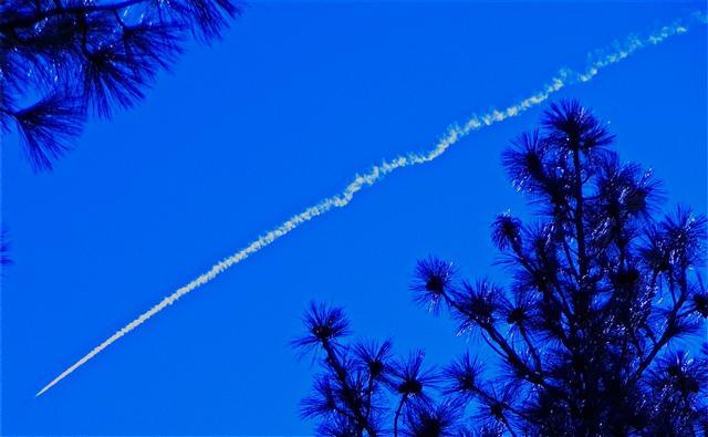 March 22, 2010, Gen. Paul H. McGillicuddy Commander of the 9th Reconnaissance Wing, Beale Air Force Base, California, takes an orientation flight in a U-2 Dragonlady. As his aircraft passed directly over my house, the atmospheric conditions produced a beautiful contrail as I snapped these shots.