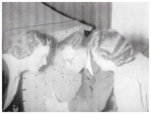 Secretly listening to the news of the war as it progressed.