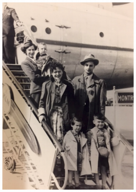 Miriam (in the flight attendantt's arms) arriving in Montreal with parents and siblings. August 1953
