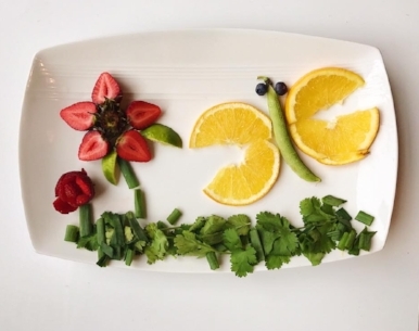 What you need: Strawberries, oranges, blueberries, snap peas For extra effect: Green onions, limes, and cilantro 